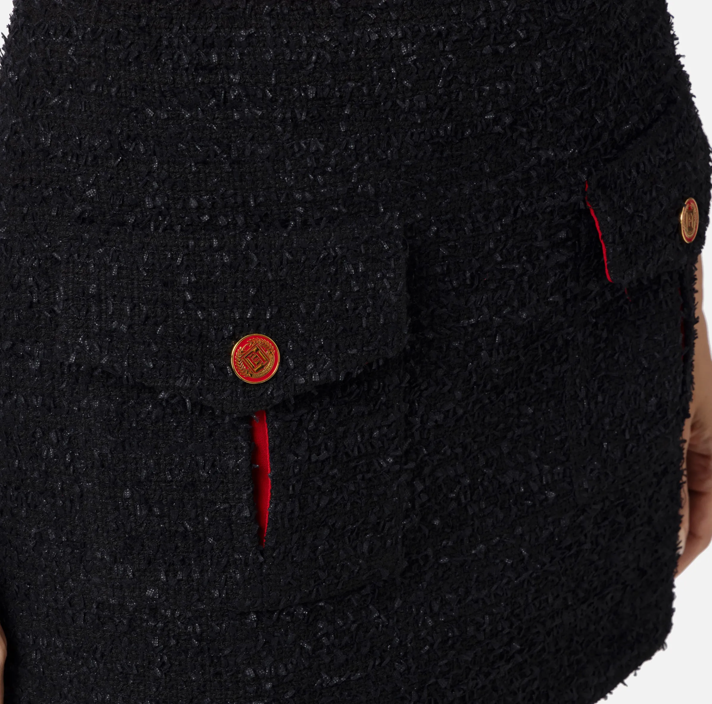 Minigonna in tweed con tasche