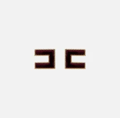 Orecchini logo in metallo dorato e velluto