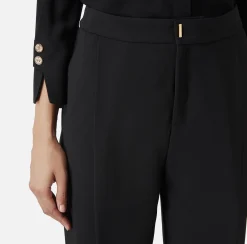 Pantalone cropped in crêpe con pinces