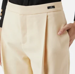 Pantalone cropped in fresco di lana stretch con pinces