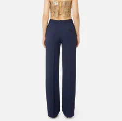 Pantalone dritto in crêpe con ricamo stemma
