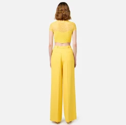 Pantalone dritto in crêpe fermo con placca logo