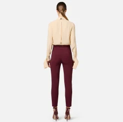 Pantalone dritto in crêpe stretch con rivetto logo
