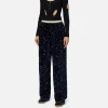 Pantalone in ciniglia ricamata con paillettes