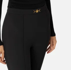 Pantalone palazzo in crêpe stretch con morsetto