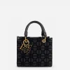 Shopper in tessuto flock con charms