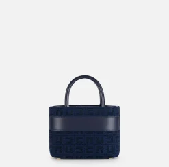 Shopper piccola in tessuto jacquard con morsetto