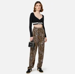 Top cropped in viscosa con bande logo