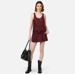 Top in tulle ricamato con frange di paillettes