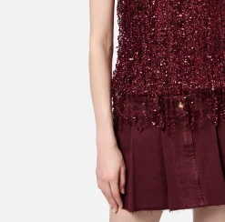 Top in tulle ricamato con frange di paillettes