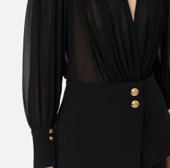 Tuta in crêpe con blusa in georgette e baschina
