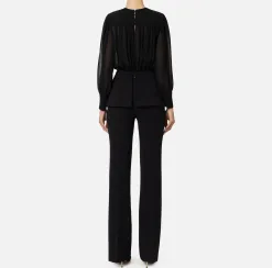 Tuta in crêpe con blusa in georgette e baschina