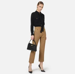 Tuta in crêpe stretch stampa rombo con fiocco