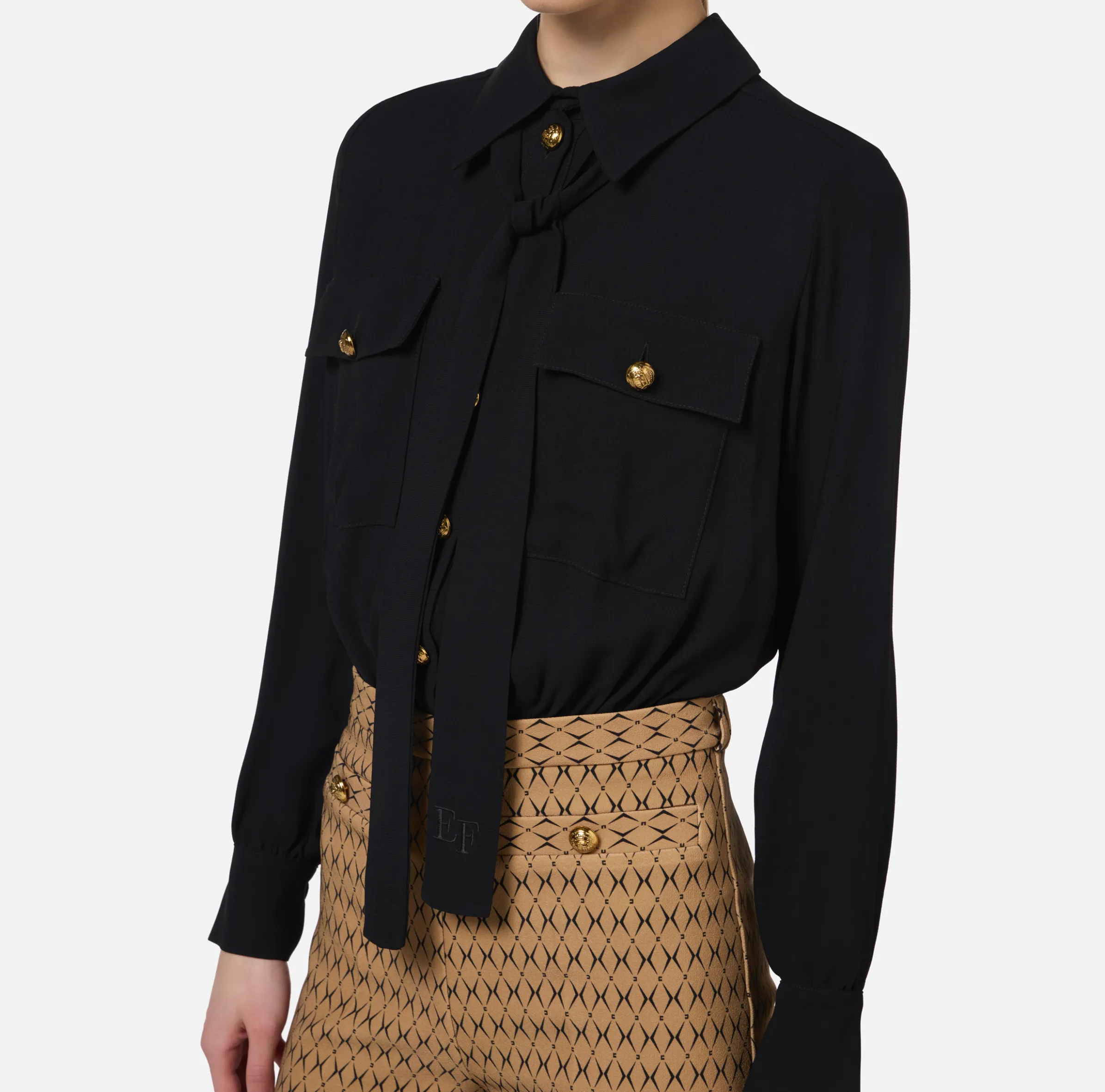 Tuta in crêpe stretch stampa rombo con fiocco