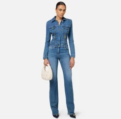 Tuta in denim con zip e spalline