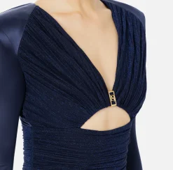 Tuta in lycra lucida con inserti plissé