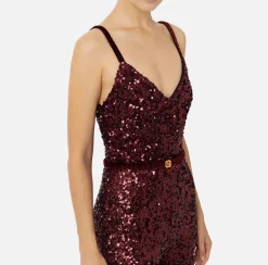 Tuta in paillettes con cintura