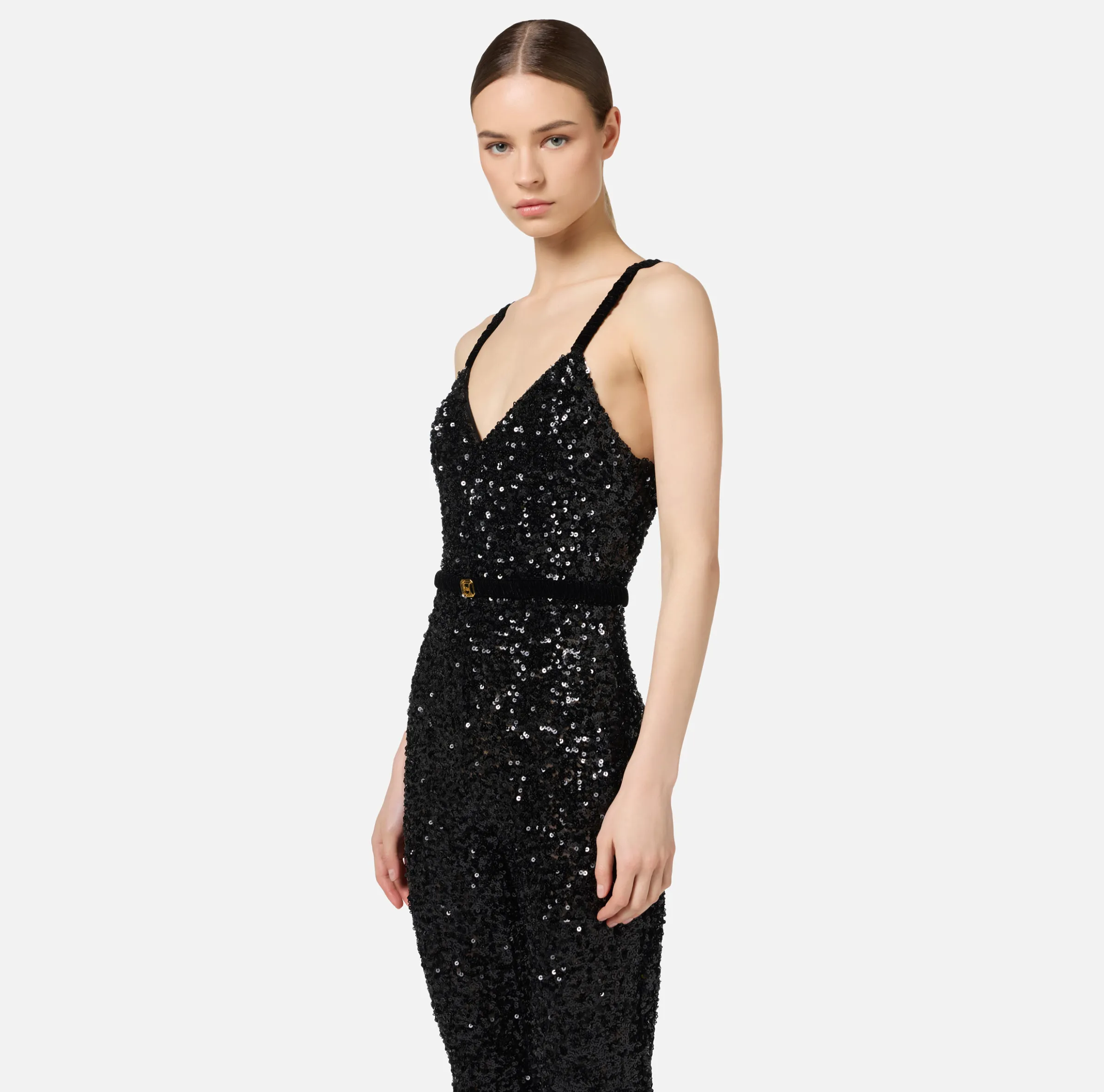 Tuta in paillettes con cintura